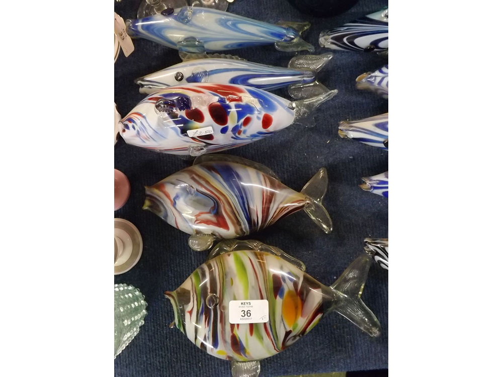 Group of five small 20th century Murano glass fish, with multi-coloured design in varying sizes,