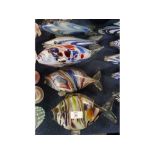 Group of five small 20th century Murano glass fish, with multi-coloured design in varying sizes,