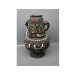Large Oriental bronze two-handled vase with enamelled decoration and fitted dragon-head handles with
