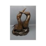 Composite bronze effect Sue Nicholson ornament of two birds, entitled "Together Again", 13ins wide x