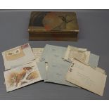 Decorative Art Deco box containing a small quantity of world stamps including Caribbean islands,