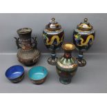 Pair of 20th century cloisonn lidded vases with dragon decoration among a black ground, and a