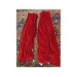 Pair of red velvet curtains, 46ins wide x 54ins deep