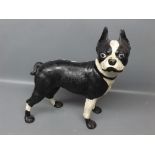 Cast iron metal model possibly of a pug, decorated in black and white with ears raised, 11 ins