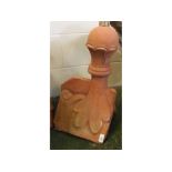 Composition terracotta coloured ridge tile, with ball finial and fluted decoration, 11 x 21ins