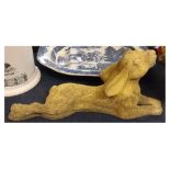 Composition sandstone model of a recumbent hare gazing skywards, 21ins wide x 9ins tall
