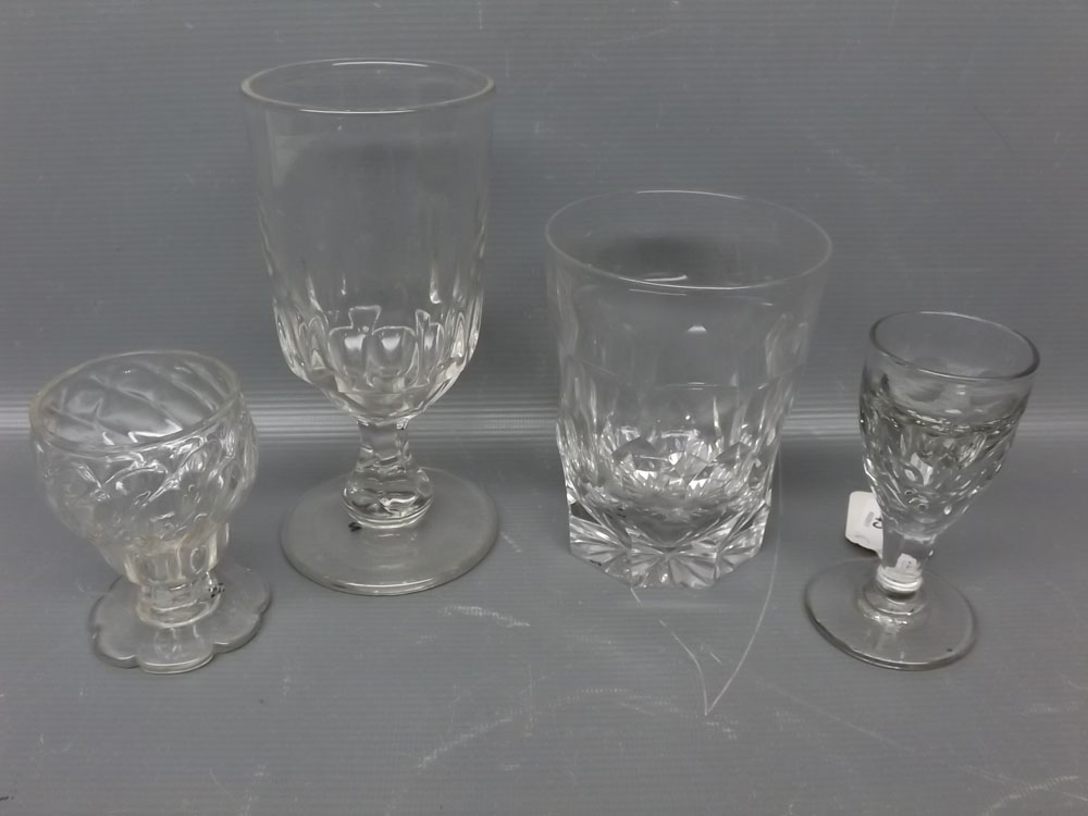Mixed Lot: four 20th century clear glasses, to include facetted glass tumble, a rummer and two squat