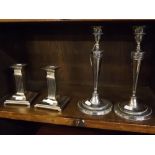 Pair of early 20th century silver plated on copper candlesticks on beaded circular bases with