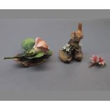 Boehm china model of wren seated on rocks among lilies, further figure entitled "Silver Jubilee