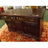 Late 20th century mahogany sideboard, with moulded overhanging cornice to two fitted drawers over