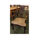 Early 20th century carved mahogany single carver armchair, the pierced splat with foliate detail and