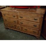 19th century pale oak and mahogany cross banded mule chest, with lifting top over two dummy drawers,