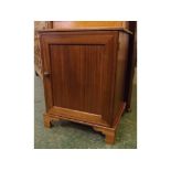 Late 20th century mahogany specimen cabinet of rectangular form with overhanging cornice and