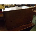 Late 19th century oak trunk of rectangular form with hinged door and compartmentalised interior,