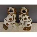 Pair of 19th century Staffordshire dogs with a gold lustre design, each 11 ins tall