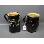 Two pottery jugs (a/f) 6 1/2 ins high