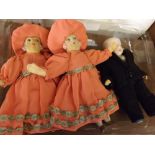 Collection of three various small dolls