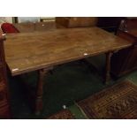 French pine rectangular farmhouse kitchen table supported on four turned legs with a scrolling