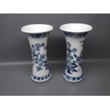 Pair of modern Meissen trumpet vases decorated in blue with an onion pattern, 9 1/2 ins high