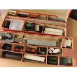 Collection of Twin Trix model railway, including locos, rolling stock, controller etc in two