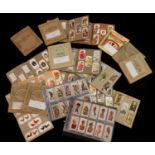 Box: 21 cigarette card sets mainly in small corner slot albums including Wills 1905, Nelson; 1912-