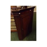 18th century oak corner hanging cupboard, with single door and shell inlaid detail and reeded sides,