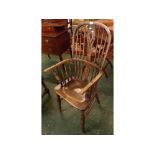 19th century elm hard seated stick back Windsor chair, with pierced splat back supported on H-