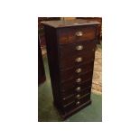 Narrow stained pine eight drawer collectors chest with brass cup handles, 19ins x 13ins x 46ins