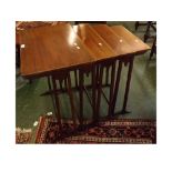 Edwardian mahogany nest of four tables with satinwood banding on square legs, largest 24 x 15 1/2