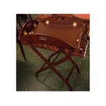 Mahogany reproduction butler's tray and stand with drop down sides to tray with openwork handles, 25