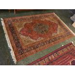 Caucasian red, cream and blue ground carpet with central floral shaped lozenge and multi gull