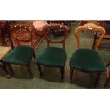 Two mahogany balloon back dining chairs, with green velour drop in seats, one with turned front legs