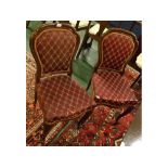 Set of six rosewood framed dining chairs, with red upholstered seat and back with ribbon details,