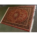@Modern Keshan floor rug, with blue and cream multi gull border with central red lozenge, 190 x 140