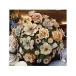 Extremely large heavily flower encrusted table centrepiece, (A/F), approx 21ins high and 22ins