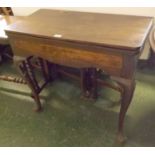 Georgian mahogany fold-over tea table, raised on four pad feet with a satinwood inlaid panel to