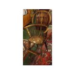 19th century elm hard seated stick back child's chair on four turned legs with foot plate on H-