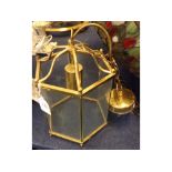 Small reproduction hexagonal lantern with etched star detail to panels, 6 1/2 ins diameter x 10ins