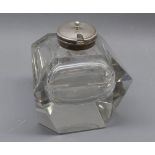 Heavy glass facetted inkwell, with silver plated lid