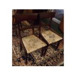 Set of four 19th century mahogany bar back dining chairs with floral drop in seats and turned and