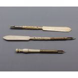 Pair of bone-handled and pierced pens with built-in paper knives and one other (3)