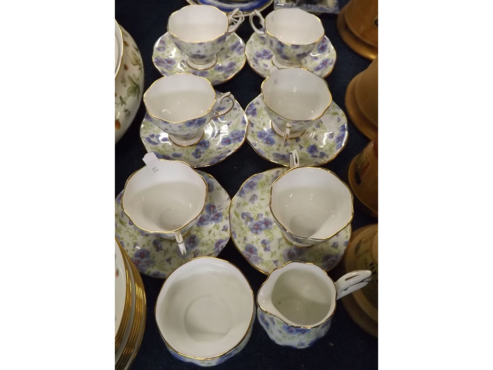 Royal Albert chintz decorated part tea wares, comprising six cups and saucers, sugar bowl and