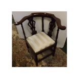 19th century mahogany corner chair with two pierced splats and three spindle supports, cream striped