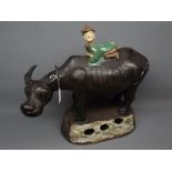 Large Chinese incense burner, in the form of a young boy riding a buffalo, 18ins wide x 17ins tall