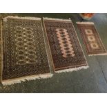 Mixed Lot: three various small modern woollen mats, each with geometric borders and fields,