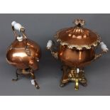 Mixed Lot: a copper tea kettle on stand together with a brass and copper tea urn, 13 1/2 ins and