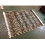 A Modern Bokhara type rug, 75 x 55ins