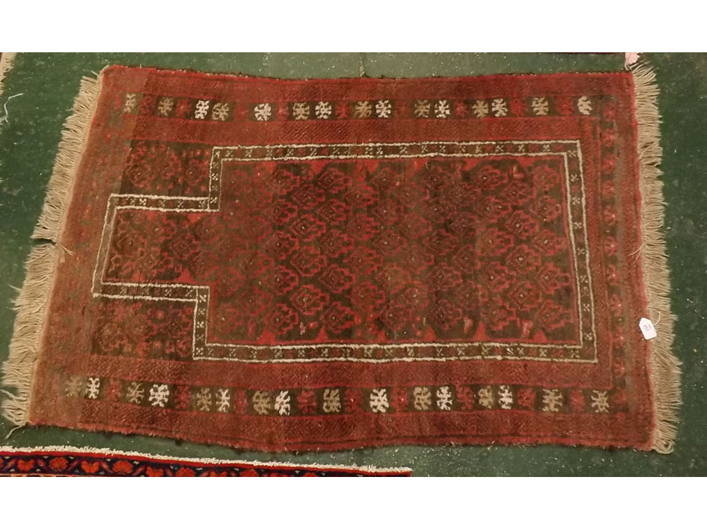 Caucasian rug, multi gull border, central panel of geometric foliage, mainly puce, beige and brown