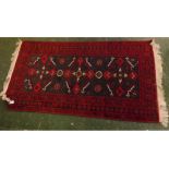 Modern Caucasian woollen carpet with dark red border and central grey field, 62 x 35ins