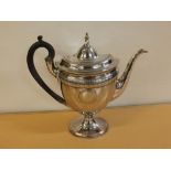 Early 19th century silver on copper tea pot, the domed cover with concealed hinge and cast finial to